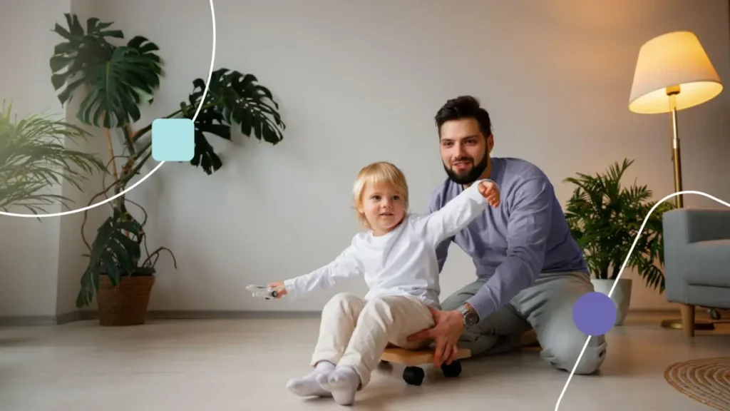 Pai e filho brincando. O Pai tenta usar técnicas de rotina visual com filho nas brincadeiras.
