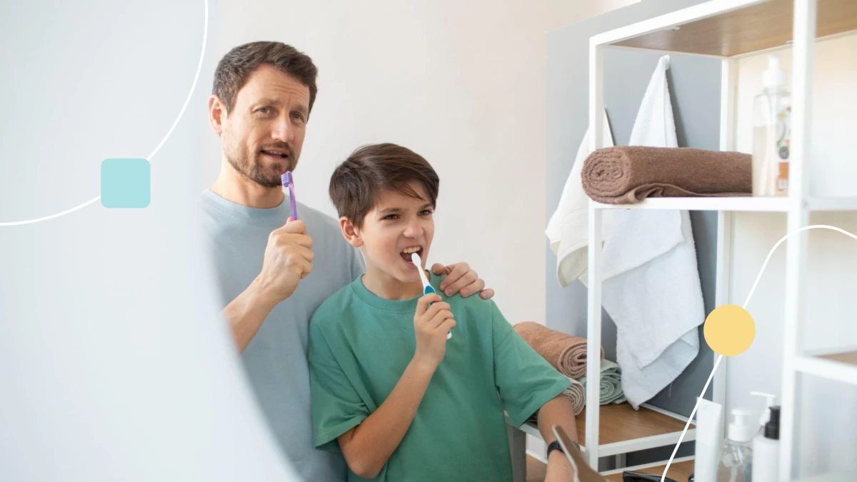 Pai e filho praticando atividades da vida diária, escovando os dentes