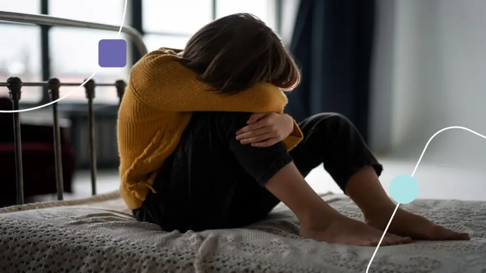 Depressão em adolescentes autistas: Menino com depressão em sua cama.