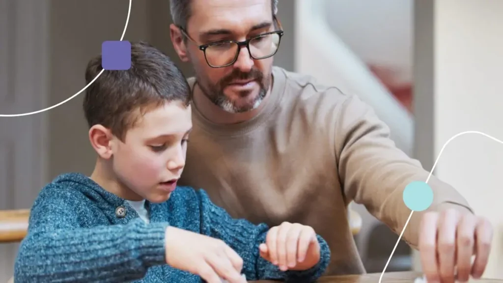 Pai exercendo métodos para alcançar a previsibilidade com seu filho autista